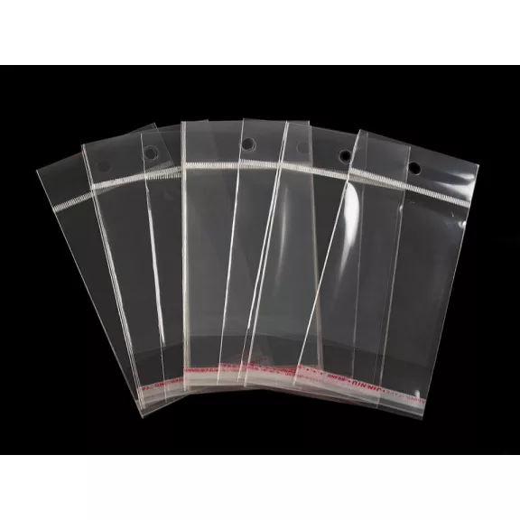 PP ragasztócsíkos celofán tasak jellegű BOPP tasak akasztóval 7x9cm - átlátszó (100 db-os csomagolás) PP ragasztócsíkos celofán tasak jellegű BOPP tasak akasztóval 7x9cm - átlátszó (100 db-os csomagolás)