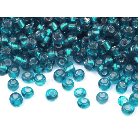 Üveg kásagyöngyök 6/0 - 4 mm-es áthúzóval - 23B türkisz (50 g-os csomagolás) Üveg kásagyöngyök 6/0 - 4 mm-es áthúzóval - 23B türkisz (50 g-os csomagolás)