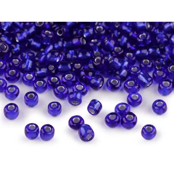 Üveg kásagyöngyök 6/0 - 4 mm-es áthúzóval - 28 blue dark (50 g-os csomagolás) Üveg kásagyöngyök 6/0 - 4 mm-es áthúzóval - 28 blue dark (50 g-os csomagolás)