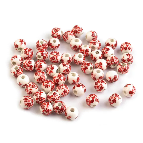 Porcelán gyöngyök virágokkal Ø6 mm - 2 eper piros (10 db-os csomagolás) Porcelán gyöngyök virágokkal Ø6 mm - 2 eper piros (10 db-os csomagolás)