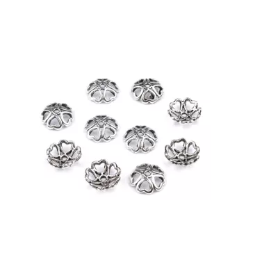   Gyöngykupak Ø10-11 mm szív - 2 platina patinával
130233 210829 130265 130268 130308 (200 db-os csomagolás)