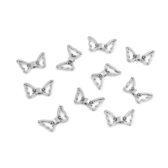 Szárny alakú díszítőelem 18x11 mm köztes ellem - platina (10 db-os csomagolás) Szárny alakú díszítőelem 18x11 mm köztes ellem - platina (10 db-os csomagolás)