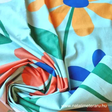   Nagy multicoloured flowers turquoise green on a background cotton percale