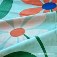   Nagy multicoloured flowers turquoise green on a background cotton percale